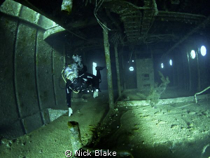 Exploring inside the wreck, Red Sea. by Nick Blake 